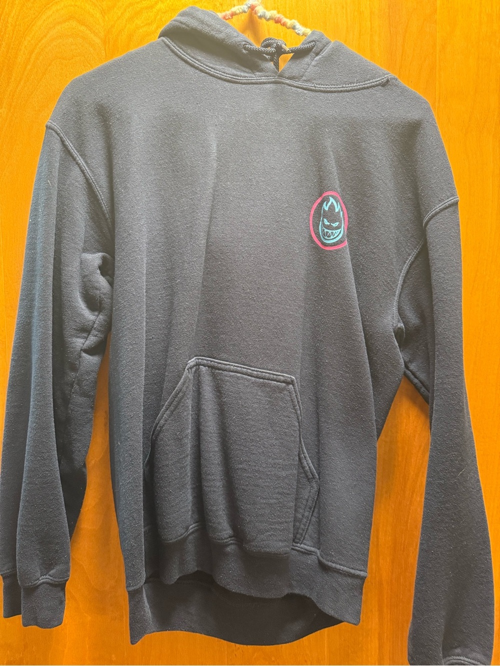 Navy Pullover Hoodie with Small Graphic